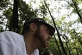 Outdoors horizontal portrait of happy hiker young man with red beard, feel good after hiking in forest. Traveler bearded male Royalty Free Stock Photo