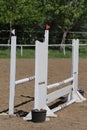 Outdoors photo of wooden barriers for jumping horses. Preparation of horses for performance on equestrian training Royalty Free Stock Photo
