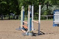 Outdoors photo of wooden barriers for jumping horses. Preparation of horses for performance on equestrian training Royalty Free Stock Photo