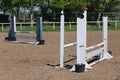 Outdoors photo of wooden barriers for jumping horses. Preparation of horses for performance on equestrian training Royalty Free Stock Photo