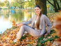 Outdoors portrait of colorful clothed gorgeous fall fashion girl