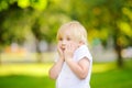 Outdoors portrait of cute emotional little boy Royalty Free Stock Photo