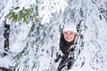 Outdoors portrait of young beautiful woman having fun in winter. Royalty Free Stock Photo