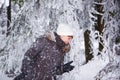 Outdoors portrait of young beautiful woman having fun in winter. Royalty Free Stock Photo