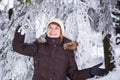 Outdoors portrait of young beautiful woman having fun in winter. Royalty Free Stock Photo