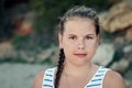 Outdoors portrait of young brunette girl.