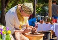 Outdoors pottery workshop.