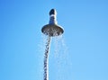 Outdoors shower with running water near the swimming pool of the hotel Royalty Free Stock Photo