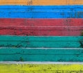 Outdoors stairs close up painted in orange, blue, red, green and yellow as colorful background Royalty Free Stock Photo