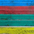 Outdoors stairs close up painted in violet, blue, red, green and yellow as colorful background. Royalty Free Stock Photo