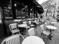 Outdoors street cafe with round tables and wicker chairs Royalty Free Stock Photo