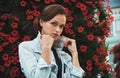 Outdoors summer portrait of a casual pretty woman