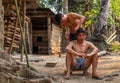 Outdoors village barber haircut Laos