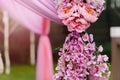 Outdoors wedding decoration with orhid bouquets