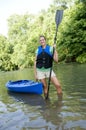 Outdoorsy female with a kayak Royalty Free Stock Photo