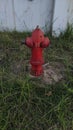 Outdor hydrant in the grass for the fire figther Royalty Free Stock Photo