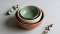 Outer bowl is terracotta, middle one is beige, and the innermost Royalty Free Stock Photo