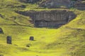 Outer slopes of Rano Raraku volcano with many moai. Rano Raraku is the quarry site where the moais were carved. Easter Island,