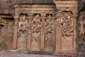 Outer wall of cave 16, facade detail with Karthikeya, Agni and Vayu, Hindu Caves, Ellora, Aurangabad, Maharashtra