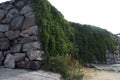 The outer wall of the Church which is underground in the cave.