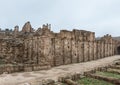 Outer wall of Temple of Zeus near South Gate in the ruins of the great Roman city of Jerash - Gerasa, destroyed by an earthquake i