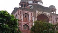 The outer walls constructed from red sandstone material in Mughal architecture