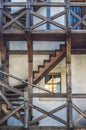 Outer wooden stairs and window Royalty Free Stock Photo