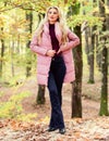 Outfit prove puffer coat can look stylish. Girl fashionable blonde walk in park. Jackets everyone should have. Best