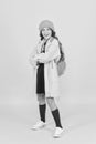 Outfit for daily school life. Feeling cool and stylish. Fall fashion. Little girl wearing stylish hat and coat