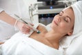 Glad woman resting during treatment