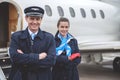 Outgoing workers standing near aircraft Royalty Free Stock Photo