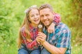 Outgrow allergies. Biggest pollen allergy questions. Father little girl enjoy summertime. Dad and daughter blowing Royalty Free Stock Photo
