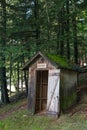 Outhouse in a Forest Royalty Free Stock Photo