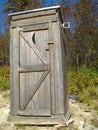 Outhouse with a little solar panel Royalty Free Stock Photo