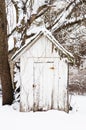 An outhouse in the snowy weather