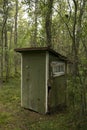 Outhouse toilet in a forest