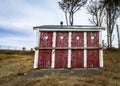 Outhouse toilet with four closed and locked doors