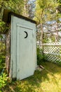 Outhouse With Crescent Moon In Door Royalty Free Stock Photo