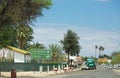 Namibian road signs on a virtually empty road and blue sky