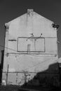 An outline of an empty billboard on the wall of an old building Royalty Free Stock Photo