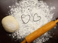 the outline of 2 hearts of flour. cooking for loved ones on Valentine's day mother's Day. background for