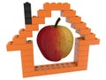 The outline of the house with an apple in the center was built of toy bricks Royalty Free Stock Photo