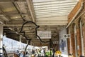 Outline of a man with a hat and a backpack on his back sculpture at Doncaster train station.