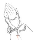 Outline of praying hands with holy rosary beads with Jesus Christ on the cross hanging.