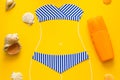 Outlines of girl in paper swimsuit drawing by chalk. Beach accessories. Top view. Flat lay. Summer travel and sun protection conce Royalty Free Stock Photo