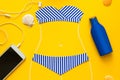 Outlines of girl in paper swimsuit drawing by chalk. Beach accessories. Top view. Flat lay. Summer travel and sun protection conce Royalty Free Stock Photo