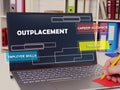 Outplacement  career guidance training employee skills inscription on the page Royalty Free Stock Photo