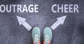 Outrage and cheer as different choices in life - pictured as words Outrage, cheer on a road to symbolize making decision and