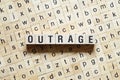 Outrage word concept on cubes Royalty Free Stock Photo