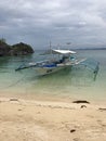 Outrigger Boat on the Beach Royalty Free Stock Photo